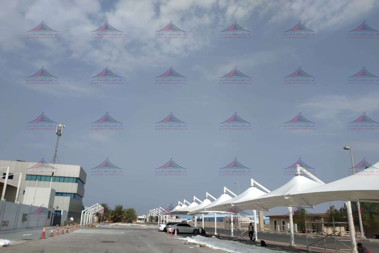 ADNOC umbrella parking shades